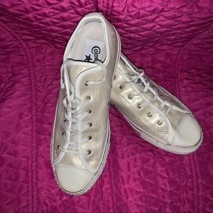 Converse gold shimmer leather low tops